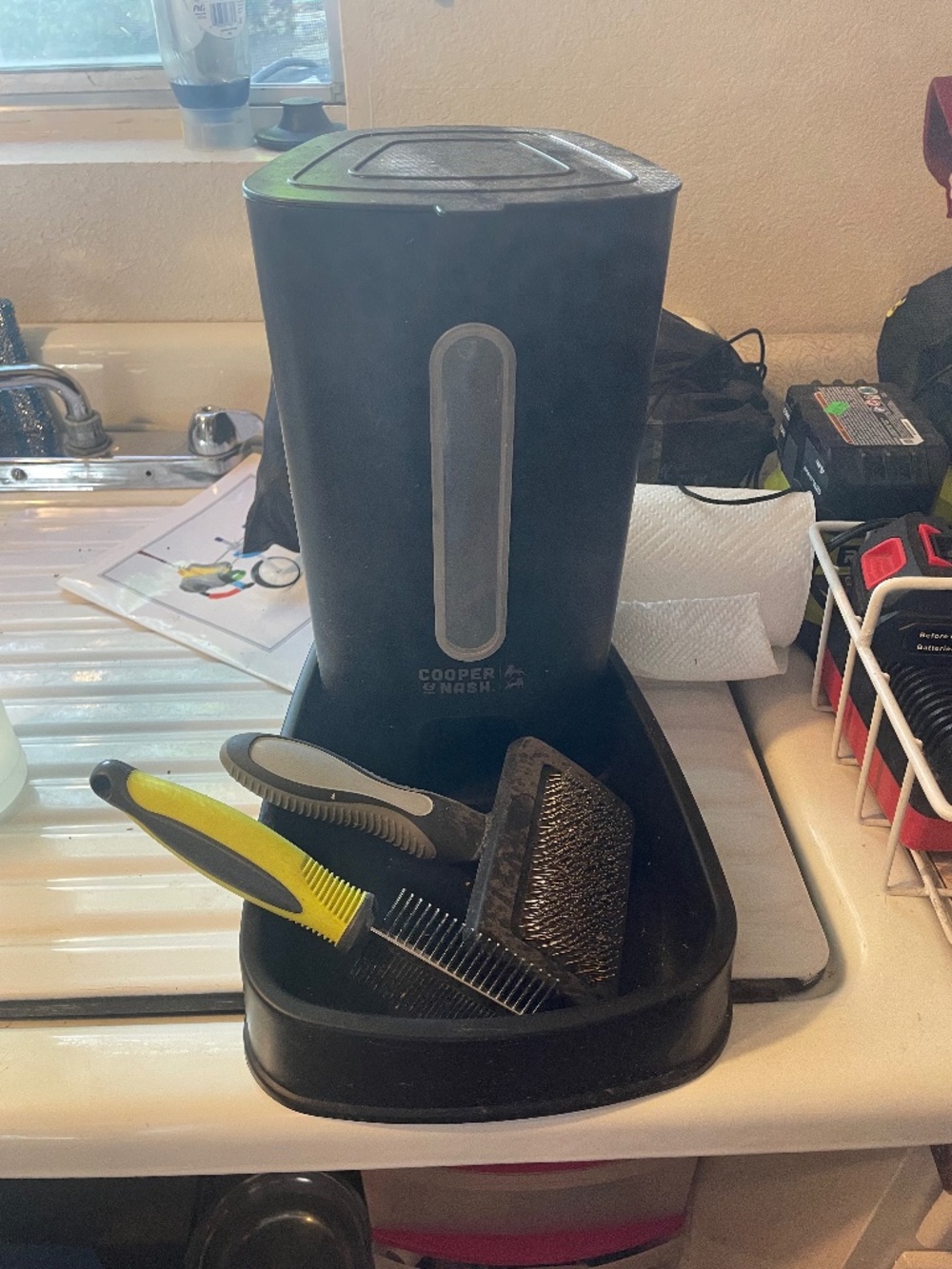 cooper and Nash: Gravity feeder and pet brushes